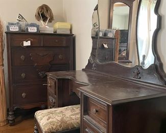 Antique bedroom set with vanity, vanity stool, dresser, and bed frame; Raquel Welch wigs