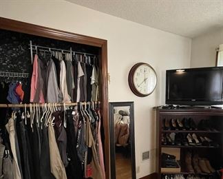 Clothing, dress shoes, boots, television, eyeglasses, and decor