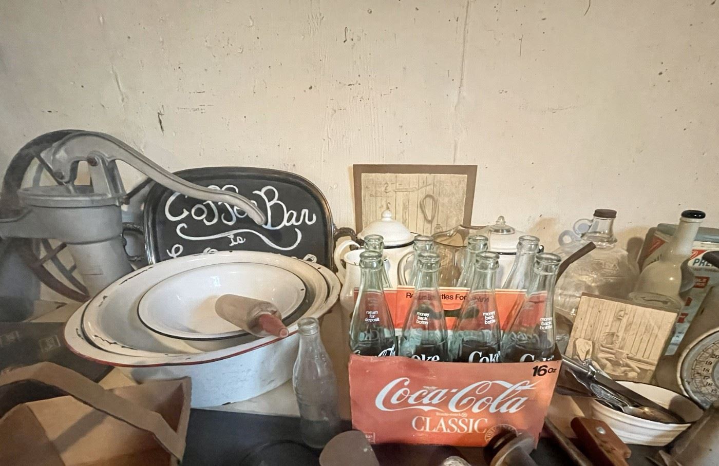 Antique Coke bottles, rolling pins, wash basins, kettles, pictures, kitchen scale, tools, silverware, and much, much more!