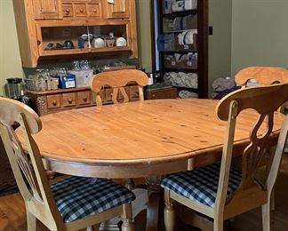 Rustic solid wood knotty pine dining room table and 4 chairs with buffet hutch