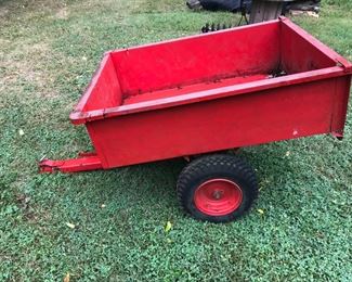 Nice red pull cart for mower