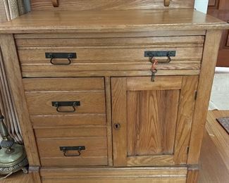 Antique 19th Century Oak One Door Three Drawer Commode with Backsplash 