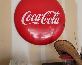 Antique metal Coca-Cola sign