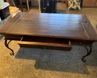 Wooden coffee table with iron legs 