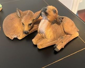 Small resting deer with glass eyes