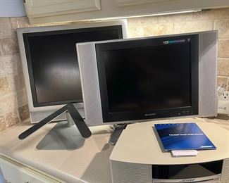 2 - Sharp TV's (model #'s LC 20E1UM  &  LC-15SH6U;