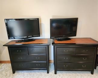 2 black dressers and 2 tv,s