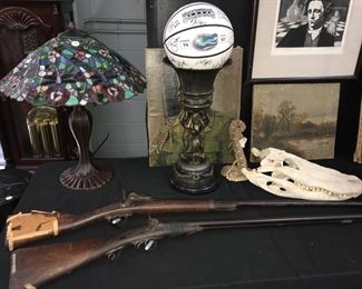 tiffany style lamp and shot guns