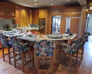 View of the kitchen with set of (6) tapestry tall stools