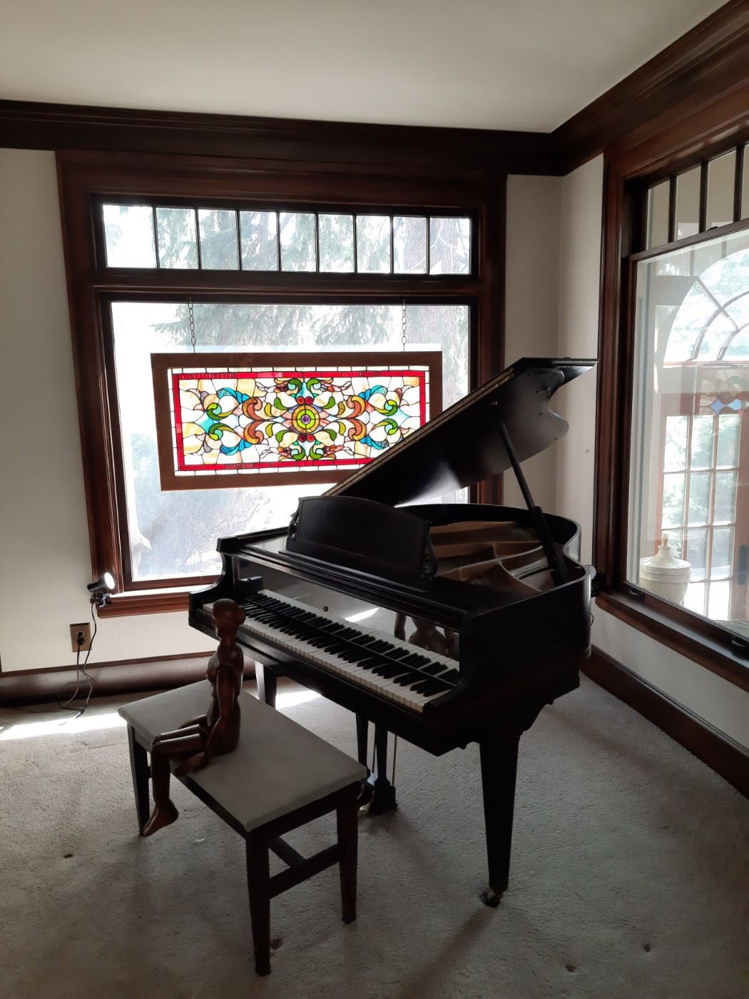 Antique grand piano with bench