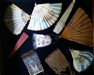 Some of the antique hand fans; a few of the 1900's beaded bags.