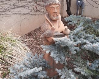 Terracotta St. Francis in side yard