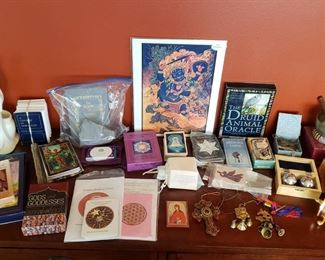 Tarot and oracle cards. Runes. Angel cards. Tibetan prayer wheel. Tibetan singing bowl. Tingshas. Harmony balls.  Rattle.  Decor.