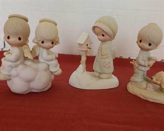Three Precious Moments figurines