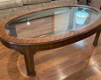 8_____$180 	
Coffee table oval glass top 52x31x16