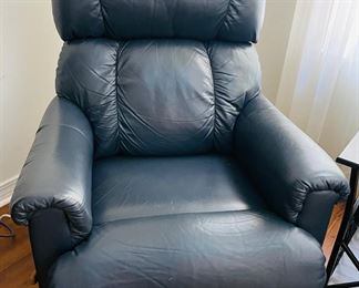 27_____$130 	
One of two naugahide Manual blue recliner 40Tx32W	