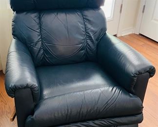 27_____$130 	
One of two naugahide Manual blue recliner 40Tx32W	