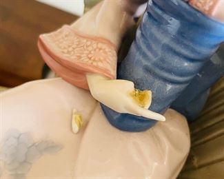 38_____$250 	
Lladro 1383 China lady in rikshaw 15x13x9 - missing finger -AS is 