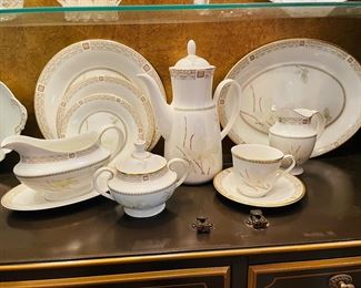 _____$325 
White Nile Royal Doulton Set of china for 8 - 1962-1963		
		"2 oval bowls, meat platter, coffee pot, C&S, milk, gravy bowl "		
		"12 dinner plates, 14 salad or dessert, 10 B&B plates, 12 cups & saucers "		
		Total 56 pieces 	