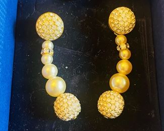 _____$50 	
Swarovski pearl drop earrings 