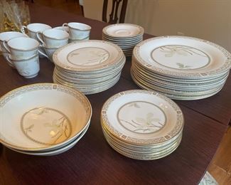 _____$325 
White Nile Royal Doulton Set of china for 8 - 1962-1963		
		"2 oval bowls, meat platter, coffee pot, C&S, milk, gravy bowl "		
		"12 dinner plates, 14 salad or dessert, 10 B&B plates, 12 cups & saucers "		
		Total 56 pieces 	