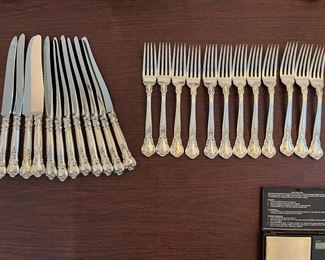 $2,150 - Chantilly gorham Sterling flatware 110 pieces - 12 dinner knifes (not weighted) , 12 dinner forks, 12 salad or dessert forks, 12 spoons, 12 butter spreaders, 12 ice tea spoons, 12 apetizer forks, 8 demi tasses spoons, 18 serving pieces (3 not weighted)- total 110 pieces 