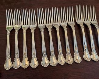 $2,150 - Chantilly gorham Sterling flatware 110 pieces - 12 dinner knifes (not weighted) , 12 dinner forks, 12 salad or dessert forks, 12 spoons, 12 butter spreaders, 12 ice tea spoons, 12 apetizer forks, 8 demi tasses spoons, 18 serving pieces (3 not weighted)- total 110 pieces 
