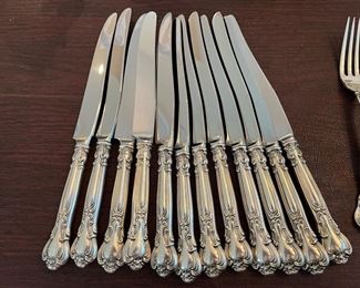 $2,150 - Chantilly gorham Sterling flatware 110 pieces - 12 dinner knifes (not weighted) , 12 dinner forks, 12 salad or dessert forks, 12 spoons, 12 butter spreaders, 12 ice tea spoons, 12 apetizer forks, 8 demi tasses spoons, 18 serving pieces (3 not weighted)- total 110 pieces 