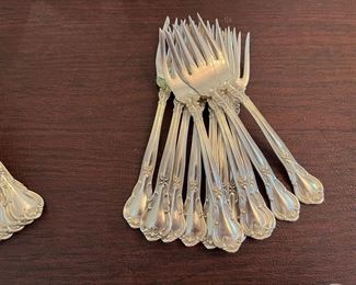 $2,150 - Chantilly gorham Sterling flatware 110 pieces - 12 dinner knifes (not weighted) , 12 dinner forks, 12 salad or dessert forks, 12 spoons, 12 butter spreaders, 12 ice tea spoons, 12 apetizer forks, 8 demi tasses spoons, 18 serving pieces (3 not weighted)- total 110 pieces 