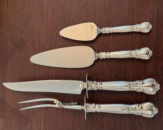 $2,150 - Chantilly gorham Sterling flatware 110 pieces - 12 dinner knifes (not weighted) , 12 dinner forks, 12 salad or dessert forks, 12 spoons, 12 butter spreaders, 12 ice tea spoons, 12 apetizer forks, 8 demi tasses spoons, 18 serving pieces (3 not weighted)- total 110 pieces 