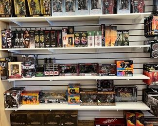 Various action figures...Mortal Kombat, The Witcher, Gozilla, horror and much more