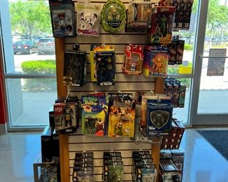 Various action figures...Rick & Morty, Bob Ross, and more