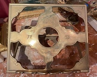 1765 brass book holder.
