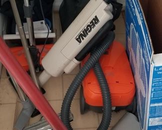 Vacuum cleaners - new Kenmore canister; Regina upright