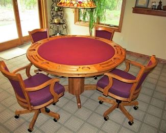 Reversible poker table with swivel chairs