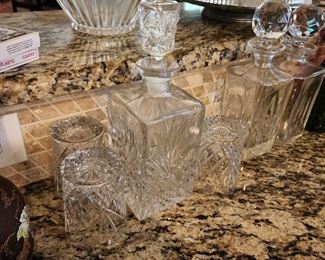 lots of crystal decanters