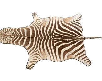 Zebra hide rug