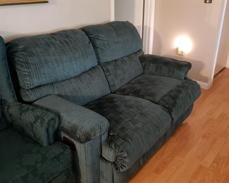 Wall hugger reclining loveseat 