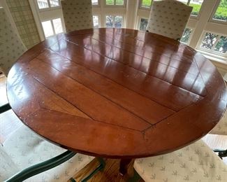 Wright Table Company 60" round cherry table.  Octagon insert and double cabriolet legs and scallop apron.