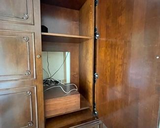 Downing Street custom bookcase.  Two upper panel, pocket doors, one fixed shelf.  Lower panel doors, one adjustable shelf.