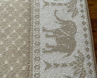 Custom Sam Kasten custom rug with elephant pattern border.  7'6" x 9'0" (Two available)