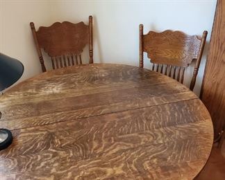 54" Round Oak Pedestal Table w/ Claw Feet and 6 Leaves