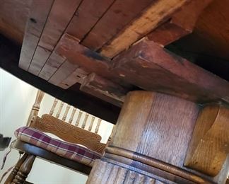 Underside of oak pedestal table