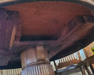 Underside of oak pedestal table