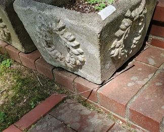 Pair of matching concrete planters