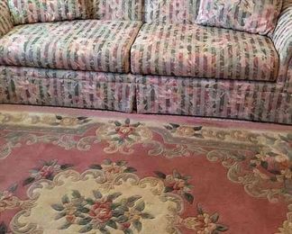 Floral Hump Back Sofa With Large Area Rug