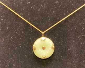 Jade on 14 karat yellow gold 18" chain