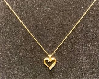 14 kt yellow gold with diamonds on a 16" chain
