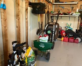 spreader garage items gas cans wheelbarrow generator