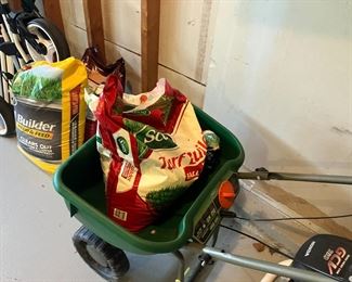 spreader garage items gas cans wheelbarrow generator